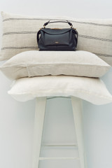 Detail product shot of the Oroton Mica Bowler in Black and Premium pebble grain leather for Women .