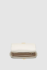 Internal product shot of the Oroton Yvonne Small Saddle Bag in Cream and Pebble Leather for Women .
