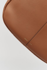 Profile view of model wearing the Oroton Emilia Large Tote in Brandy and  for Women .