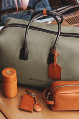 Detail product shot of the Oroton Voyager Canvas Weekender in GRY GSE/NGT SKY and Canvas material for Men .