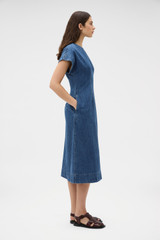 Profile view of model wearing the Oroton Denim Dress in Denim and 100% cotton fabric for Women .