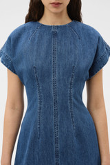 Profile view of model wearing the Oroton Denim Dress in Denim and 100% cotton fabric for Women .