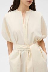 Profile view of model wearing the Oroton Grace Popover Dress in Calico and 100% cotton poplin fabric for Women .