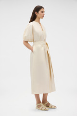 Profile view of model wearing the Oroton Grace Popover Dress in Calico and 100% cotton poplin fabric for Women .