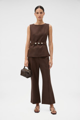Profile view of model wearing the Oroton Kick Flare Cropped Pant in Espresso and 100% heavy weight linen fabric for Women .