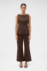 Profile view of model wearing the Oroton Kick Flare Cropped Pant in Espresso and 100% heavy weight linen fabric for Women .