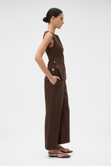 Profile view of model wearing the Oroton Kick Flare Cropped Pant in Espresso and 100% heavy weight linen fabric for Women .