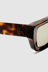 Detail product shot of the Oroton Spencer Sunglasses in Signature Tort and Acetate material for Women .