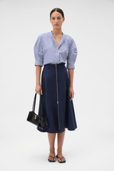 Profile view of model wearing the Oroton Sleeve Detail Stripe Shirt in North Sea/White and 100% cotton fabric for Women .