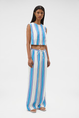 Profile view of model wearing the Oroton Shore Stripe Pyjama Pant in Sea Blue and 100% heavy linen fabric for Women .