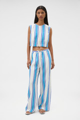 Profile view of model wearing the Oroton Shore Stripe Pyjama Pant in Sea Blue and 100% heavy linen fabric for Women .