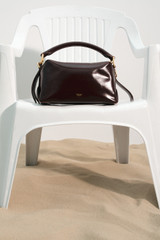 Detail product shot of the Oroton Lewis Smooth Day Bag in Copper and Premium smooth leather for Women .
