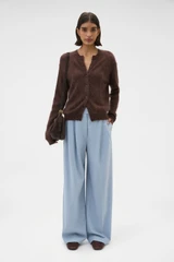 Profile view of model wearing the Oroton Cashmere Blend Cardigan in Dark Chocolate and 70% ultra-fine merino wool and 30% cashmere blend fabric for Women .