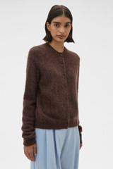 Profile view of model wearing the Oroton Cashmere Blend Cardigan in Dark Chocolate and 70% ultra-fine merino wool and 30% cashmere blend fabric for Women .