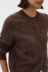 Profile view of model wearing the Oroton Cashmere Blend Cardigan in Dark Chocolate and 70% ultra-fine merino wool and 30% cashmere blend fabric for Women .