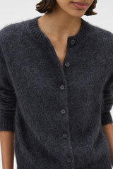 Profile view of model wearing the Oroton Cashmere Blend Cardigan in Charcoal and 70% ultra fine merino wool and 30% cashmere blend fabric for Women .