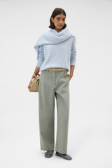 Profile view of model wearing the Oroton Barrel Twill Leg Pant in Silver Sage and 100% cotton fabric for Women .