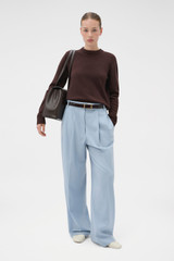 Profile view of model wearing the Oroton Embellished Rib Knit Crew in Dark Chocolate and 100% merino wool fabric for Women .