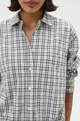 Profile view of model wearing the Oroton Check Bomber Shirt in Charcoal Check and 100% cotton fabric for Women .