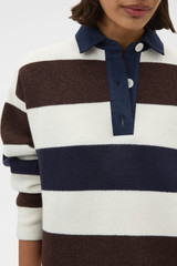 Profile view of model wearing the Oroton Contrast Collar Rugby Knit in Whipped Cream and 100% supersoft merino wool fabric for Women .