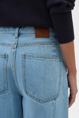 Profile view of model wearing the Oroton Barrel Leg Denim Jean in Light Vintage Wash and 100% cotton fabric for Women .