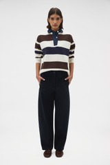Profile view of model wearing the Oroton Barrel Twill Leg Pant in North Sea and 100% cotton fabric for Women .