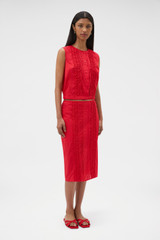Profile view of model wearing the Oroton Ruffle Detail Skirt in Red Ribbon and 100% cotton voile fabric for Women .