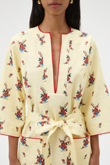 Profile view of model wearing the Oroton Wallpaper Floral Print Tunic Dress in Lemon and 100% midweight linen fabric for Women .