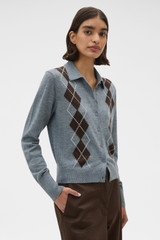 Profile view of model wearing the Oroton Argyle Cardigan in Grey Marle and 55% extra fine merino wool and 45% cotton blend fabric for Women .