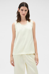 Profile view of model wearing the Oroton Double Satin Tank in Champagne and 100% viscose fabric for Women .