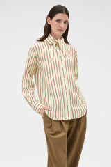 Profile view of model wearing the Oroton Stripe Tie Neck Shirt in Lemon/Rich Red and 100% silk habotai fabric for Women .