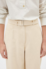 Profile view of model wearing the Oroton Washed Twill Barrel Leg Pant in Coconut and 100% cotton fabric for Women .