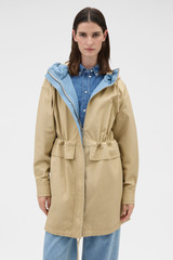 Profile view of model wearing the Oroton Washed Twill Parka in Soft Camel and 100% cotton twill fabric for Women .