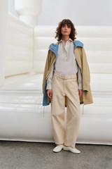 Profile view of model wearing the Oroton Washed Twill Parka in Soft Camel and 100% cotton twill fabric for Women .