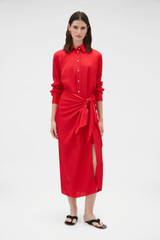 Profile view of model wearing the Oroton Silk Sarong Dress in Poppy and 100% silk twill fabric for Women .