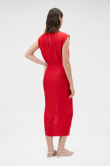 Profile view of model wearing the Oroton Silk Sarong Skirt in Poppy and 100% silk twill fabric for Women .