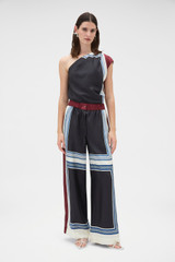 Profile view of model wearing the Oroton Silk Scarf Pyjama Pant in Black and 100% silk twill fabric for Women .