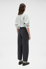 Profile view of model wearing the Oroton Washed Twill Barrel Leg Pant in Washed Black and 100% cotton fabric for Women .