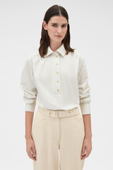Profile view of model wearing the Oroton Soft Check Button Shirt in Cream and 100% cotton fabric for Women .