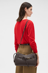 Profile view of model wearing the Oroton Cleo Smooth Shoulder Bag in Dark Chocolate and Premium smooth leather for Women .
