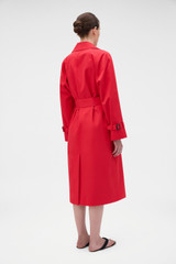 Profile view of model wearing the Oroton Essential Mac in Poppy and 100% cotton fabric for Women .