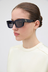 Profile view of model wearing the Oroton Spencer Sunglasses in Dark Navy and Handcrafted acetate frame for Women .