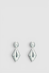 Front product shot of the Oroton Banks Drop Earrings in Bright Silver and Premium brass material for Women .