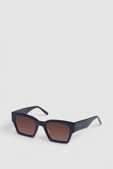 Front product shot of the Oroton Stevie Bio Acetate Square Sunglasses in Black and Handcrafted biodegradable bio-acetate frame for Women .