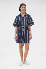 Profile view of model wearing the Oroton Rope Print Sailor Dress in North Sea and 100% cotton fabric for Women .