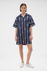 Profile view of model wearing the Oroton Rope Print Sailor Dress in North Sea and 100% cotton fabric for Women .