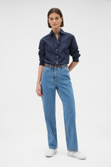 Profile view of model wearing the Oroton Straight Leg Denim Jean in Mid Vintage Wash and 100% cotton fabric for Women .