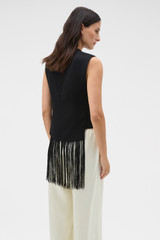 Profile view of model wearing the Oroton Fringe Detail Top in Black and 96% viscose and 4% spandex blend fabric for Women .