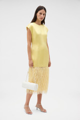 Profile view of model wearing the Oroton Feather Jacquard Sheath Dress in Butter and 100% polyester fabric for Women .
