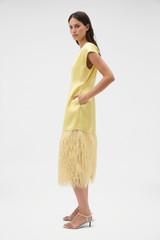 Profile view of model wearing the Oroton Feather Jacquard Sheath Dress in Butter and 100% polyester fabric for Women .
